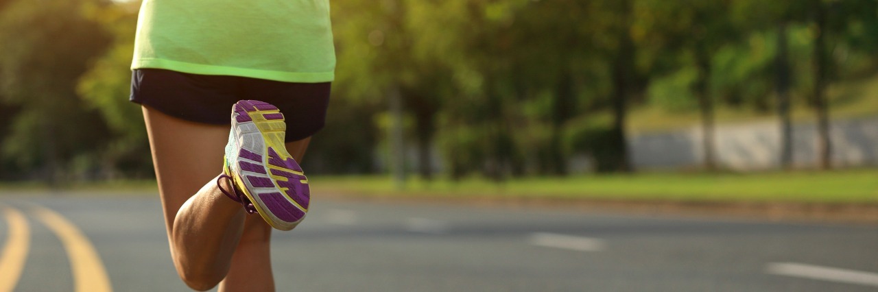 Choosing to Run for Rare in the New York City Marathon young fitness woman runner running on road