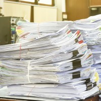 Pile of documents on desk stack