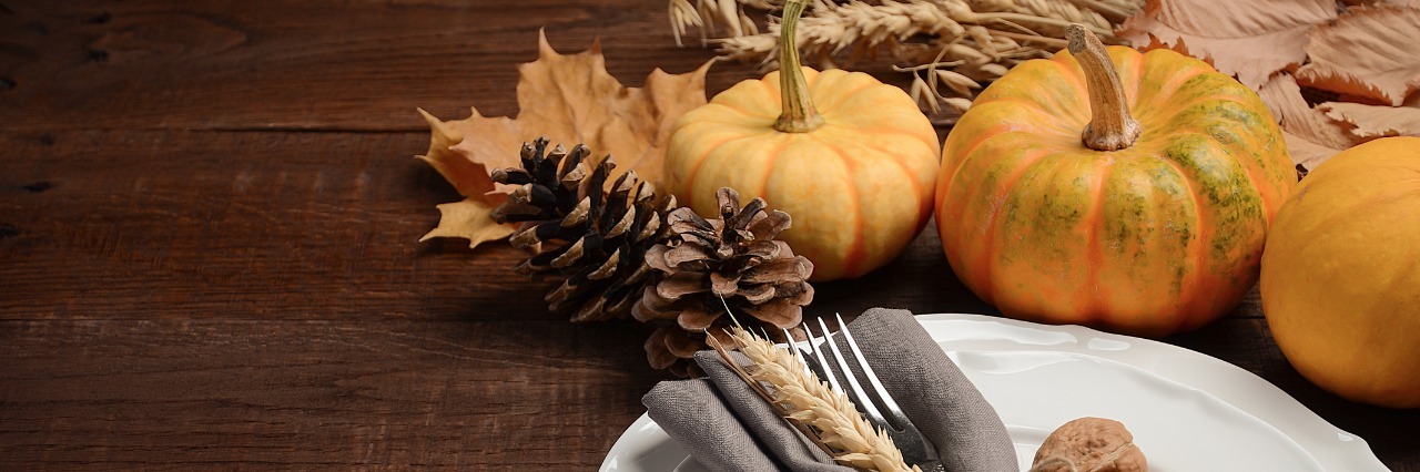 Difficulties of the Holiday Season for People With Gastroparesis autumn table setting with pumpkins and acorns