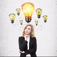 businesswoman thinking with a lightbulb over her head