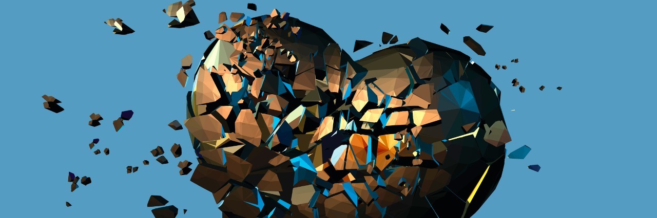 Kintsukoroi: Finding Beauty After Having My Small Intestine Removed Golden metal polygonal broken heart on blue background