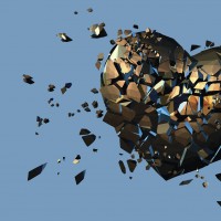 Golden metal polygonal broken heart on blue background