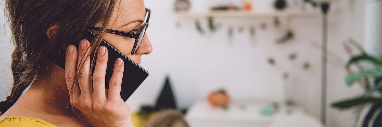 What It's Like to Be a Mom With Depression stressed mother talking on her phone