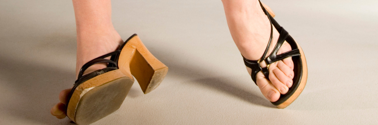 Challenges I Face Because of My Dyspraxia Woman tripping and falling.