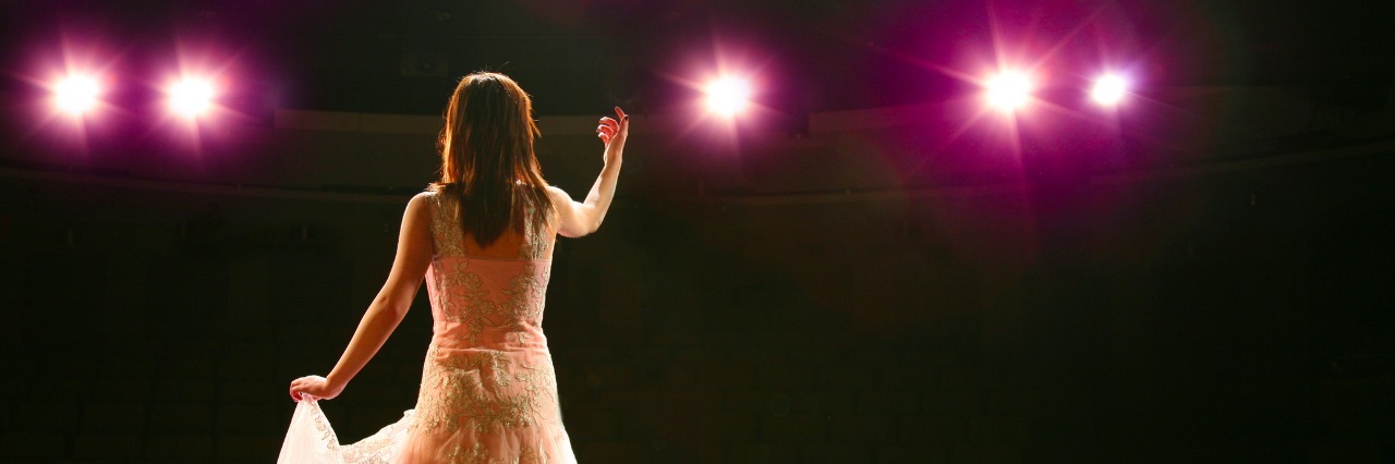 When I Thought I Wouldn't Be Able to Pursue My Dreams Because of Illness girl in long gown performing on stage