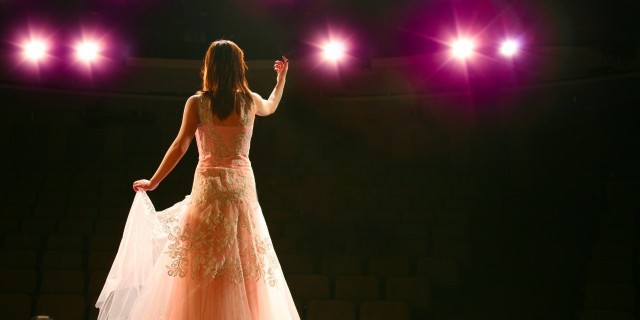 When I Thought I Wouldn't Be Able to Pursue My Dreams Because of Illness girl in long gown performing on stage