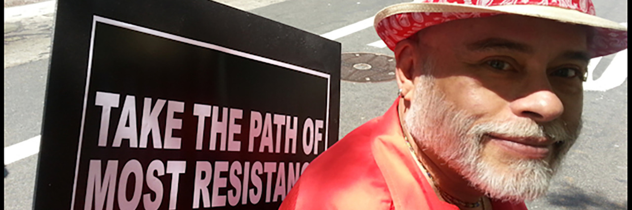 Adjusting to Using a Wheelchair With Inclusion Body Myositis Felix at the LGBT Pride Parade in New York City.
