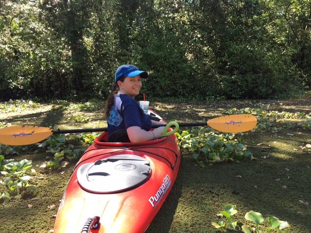 woman kayaking in a lake