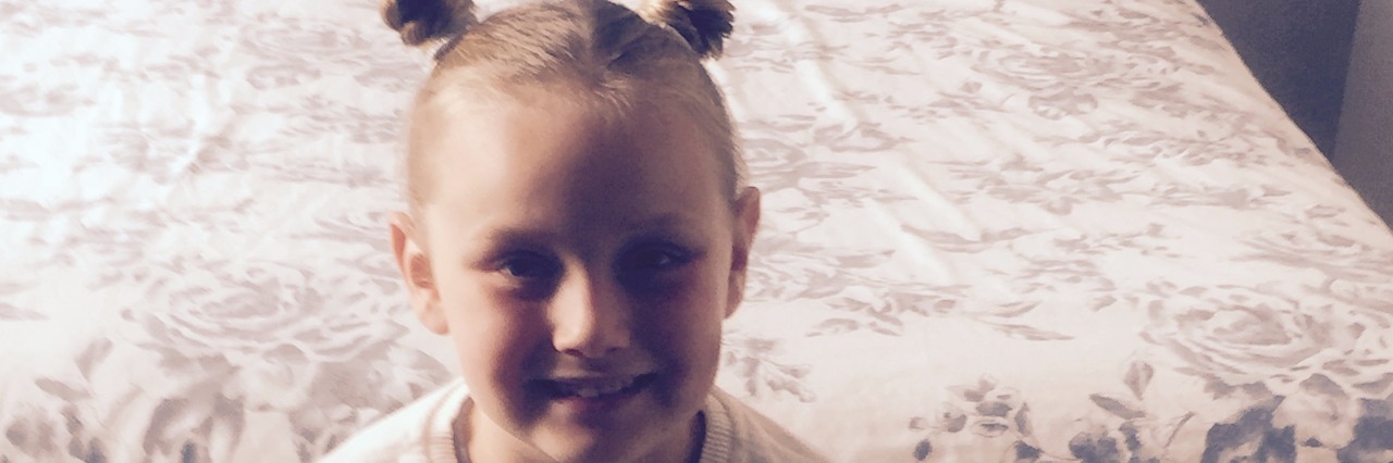 Mom Responds to Woman Upset Her Daughter Was Staring little girl smiling