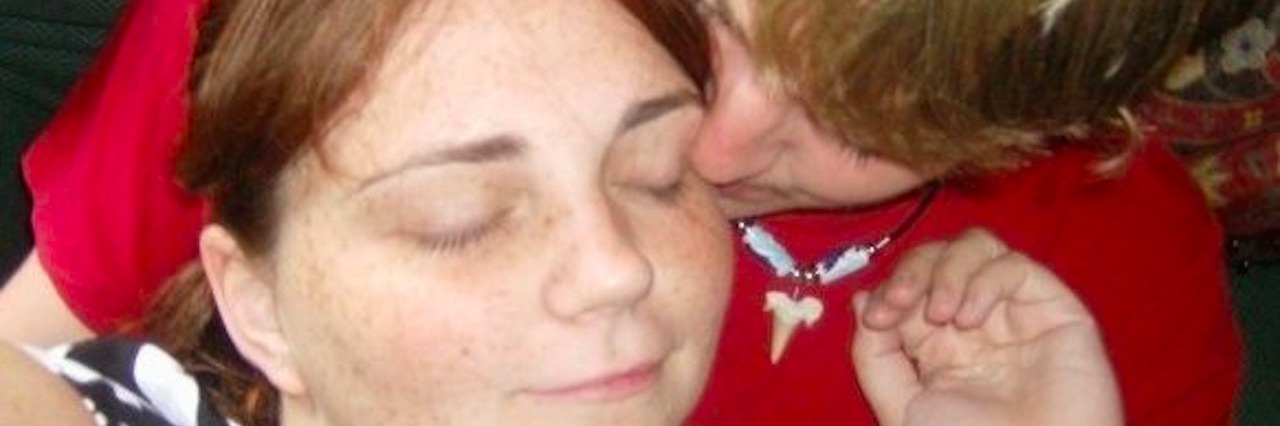 Letter to Husband From Wife With PTSD man hugging woman