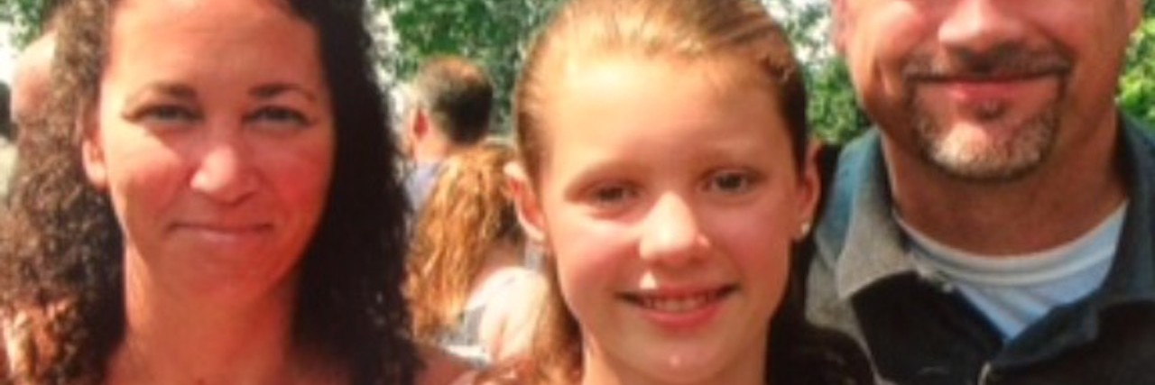 What It's Like Going to School With Trichotillomania the author as a young girl and her parents