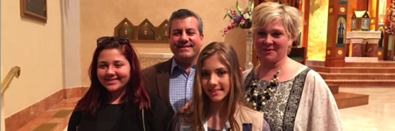 Dealing With Mommy Guilt and Pressure as a Woman With Chronic Illness parents and two teenage girls in fancy room