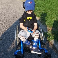 Jennifer's son in his wheelchair