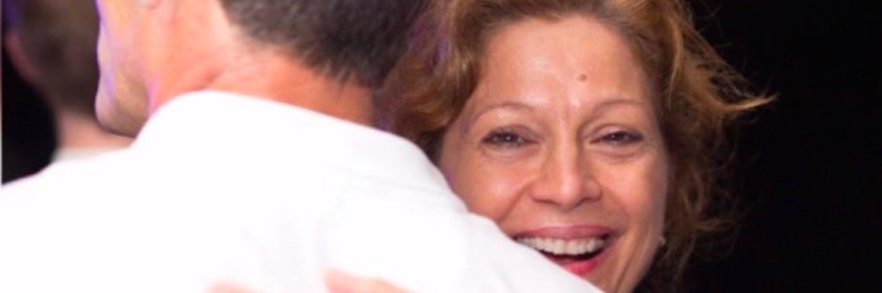 Lessons After a Parent Dies of Suicide A woman dancing with her husband