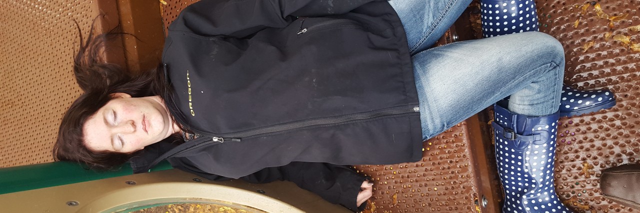 Why My Fun Days Would Be Bad for Healthy People woman lying on playground structure