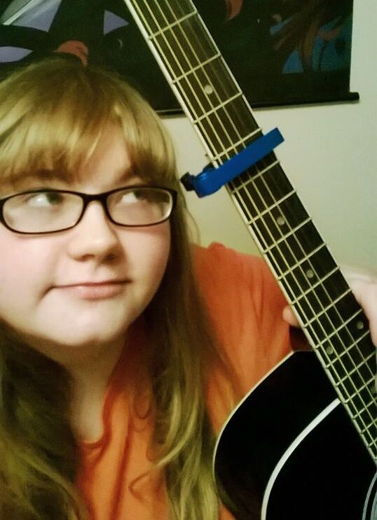 A girl with her guitar