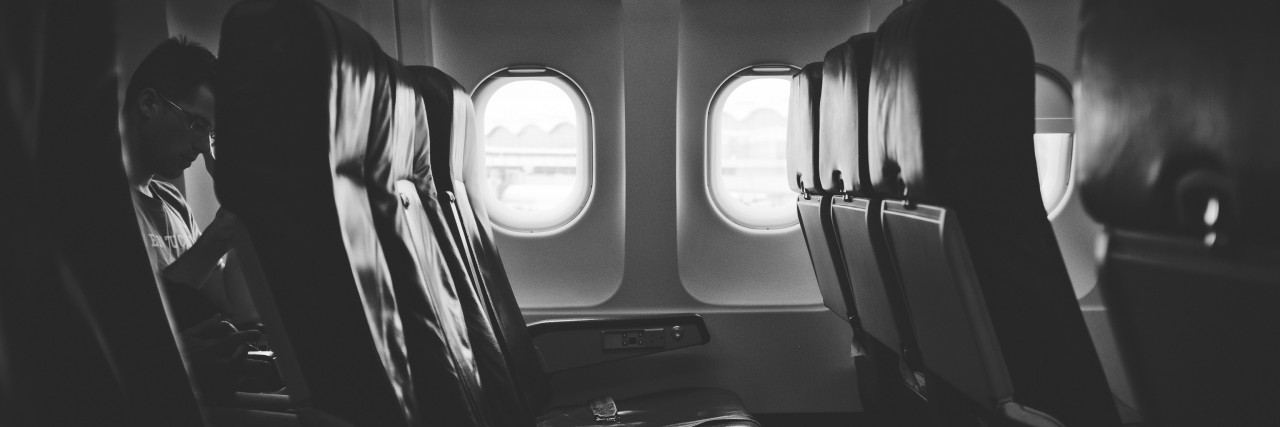 Letter to Airline Employees From a Person With an Invisible Disability inside an airplane.