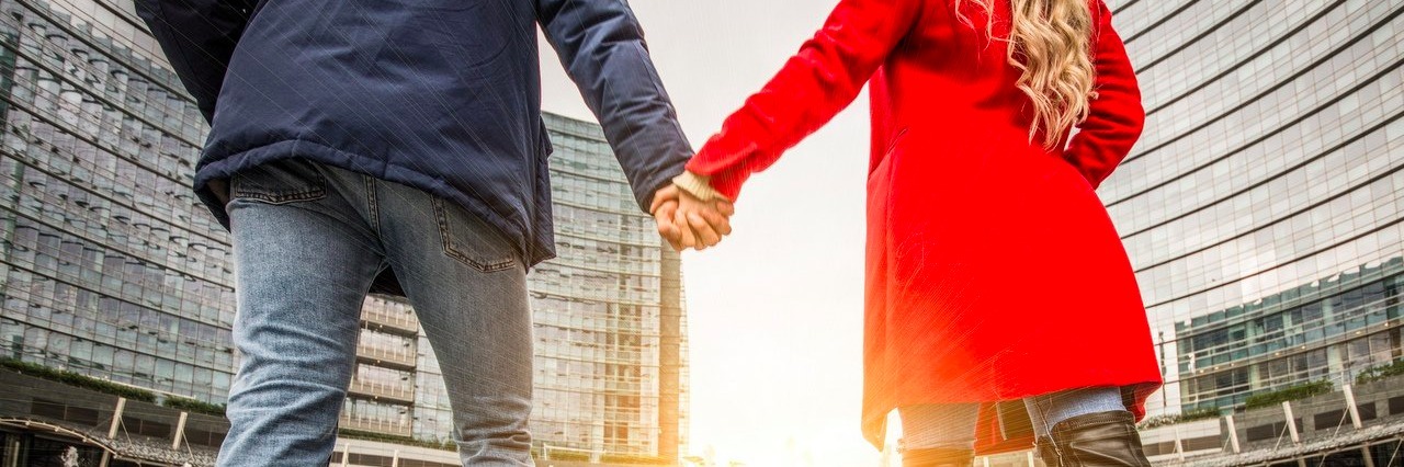 Things to Remember If Your Significant Other Has a Chronic Illness Couple walking and holding hands