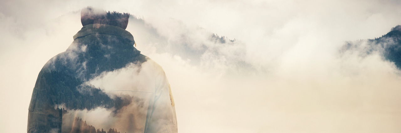 Bipolar Disorder: When You're Recovering but Not Cured Double Exposure of Man and Cloudy Mountains forest Travel Lifestyle conceptual background