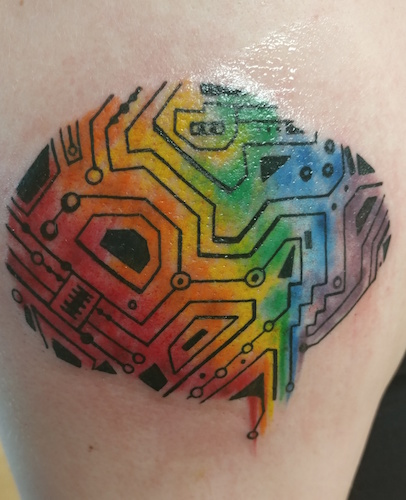 Rainbow color tattoo that symbolizes author's autism