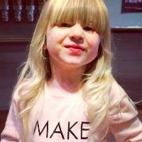 young girl with a make today awesome t-shirt