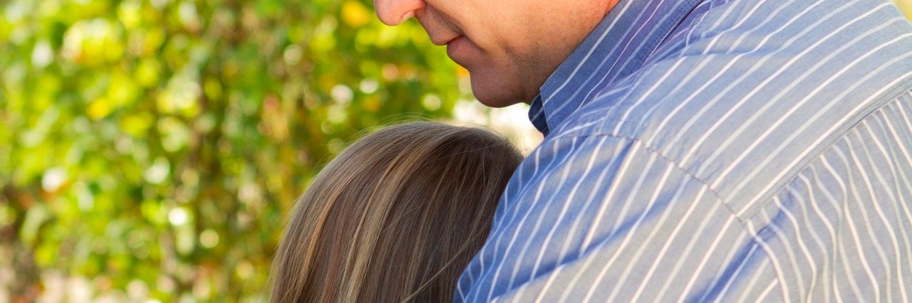 Father Looks at the Positive Side of His Daughter’s Chronic Illnesses father hugging his daughter