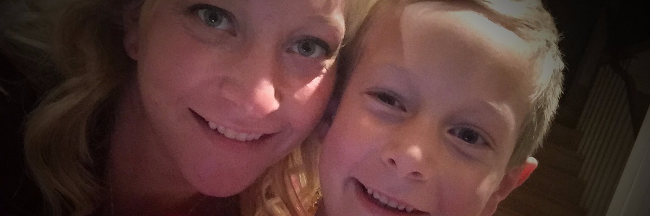 What I've Learned From My Son on the Autism Spectrum as a Mom Mom and son smiling, with mom's face next to son's