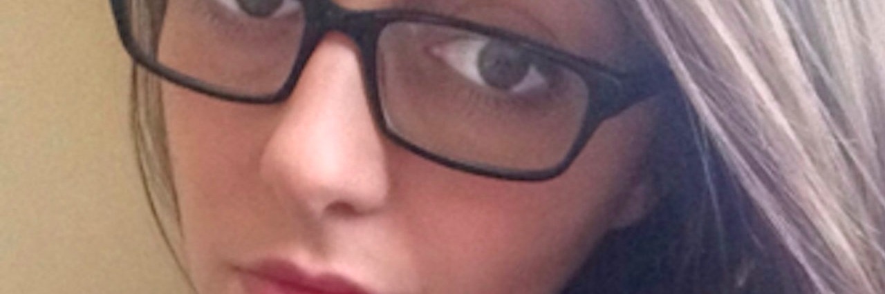 Letter to the Woman Chided Me for a Using a Handicapped Space woman with glasses