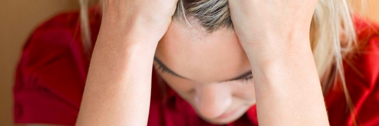 Getting Unwanted Opinions About Your Chronic Illnesses woman pulling her hair