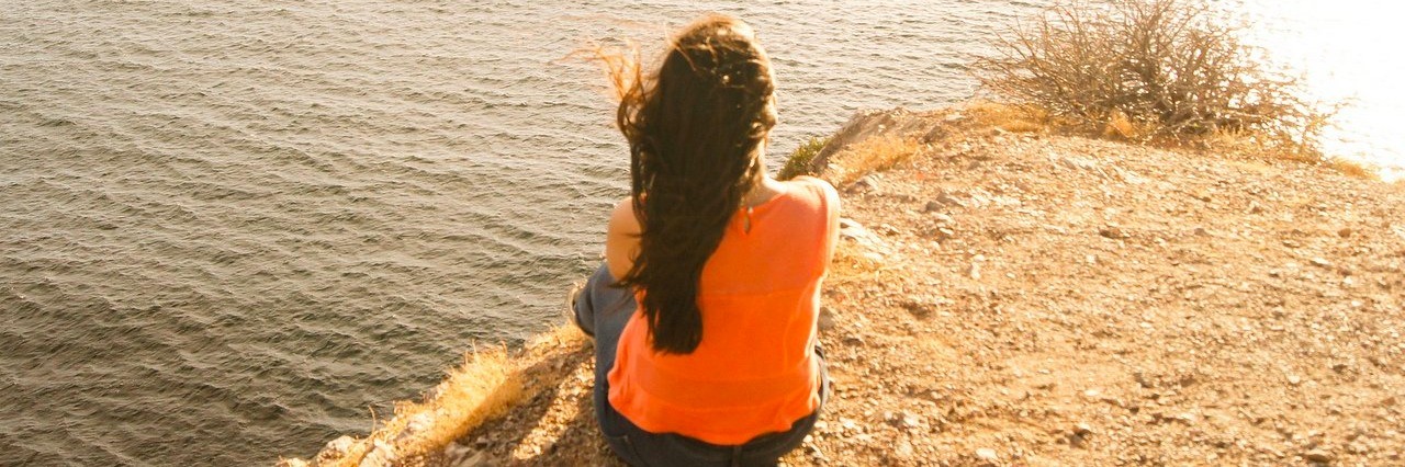 Things to Say to a Person in Your Life Who Is Chronically Ill woman looking at the sea