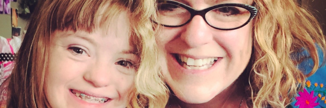 Down Syndrome: Mom Writes Letter to Herself on Day of Diagnosis Mother and daughter with heads leaning against each other, smiling