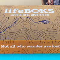photo of a brown cardboard box which says lifeBOKS
