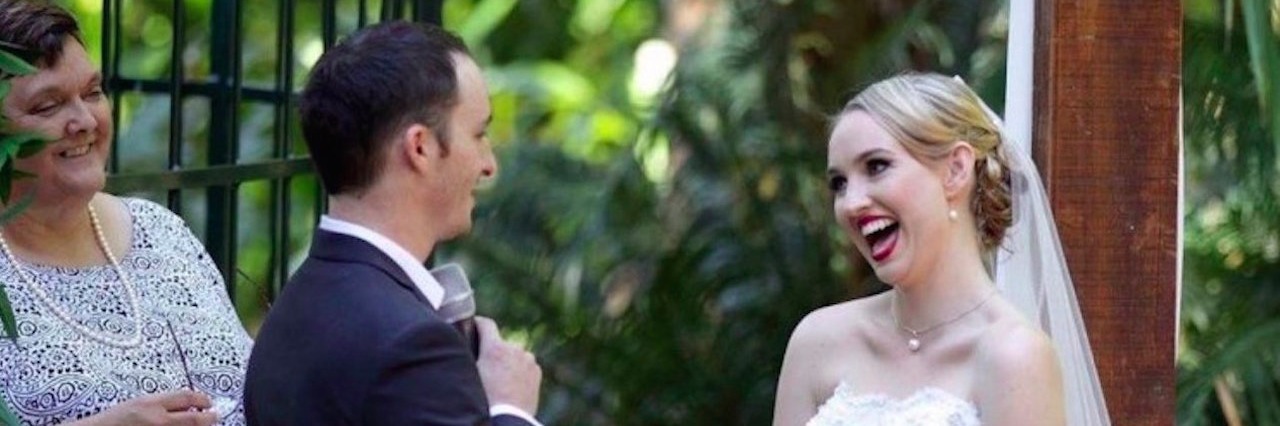 Woman With Fibromyalgia Describes What Her Wedding Day Was Like groom and bride during wedding ceremony