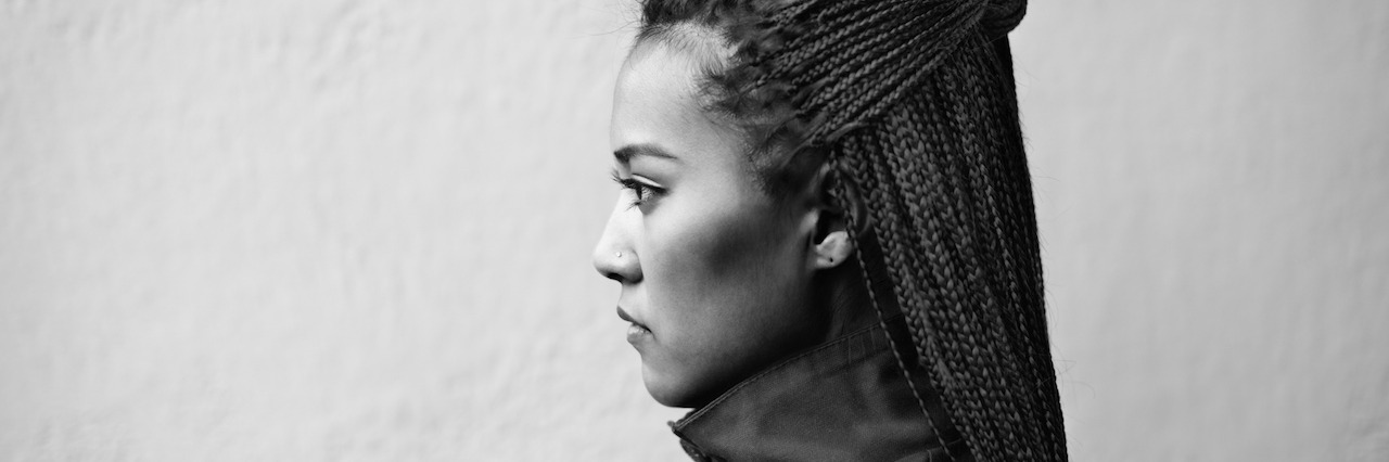 Explaining PTSD to Your Significant Other Side profile of a woman