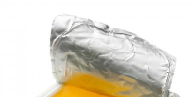 My Top 7 Tips for Managing a Medical Diet Tasty yogurt in open plastic cup isolated on white