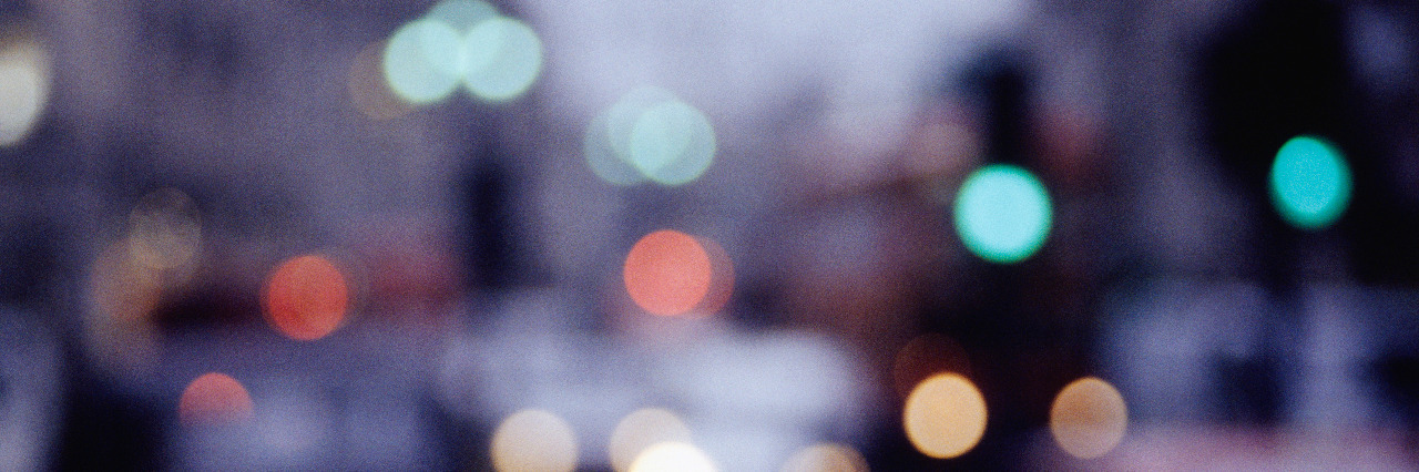 Coping With Bad Vision Days and Self-Doubt Blurry view of a city at night.