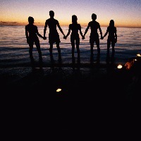 Group of friends holding hands, silhouette