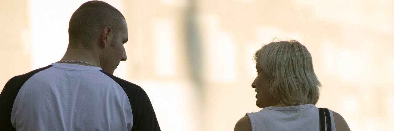 Imagining a World Without Judgment About Invisible Disabilities Two people meeting on street.