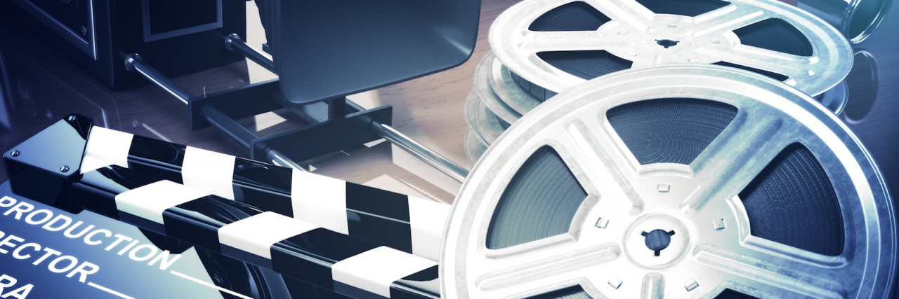 Autism: How Theater Therapy Led Me to a Career in Film Consulting Video camera, film reels, and film set clapperboard on table