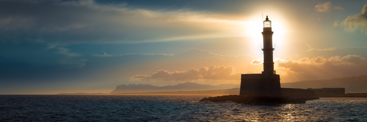 Feeling Like You're Watching Life Pass By While Sick lighthouse at sunset