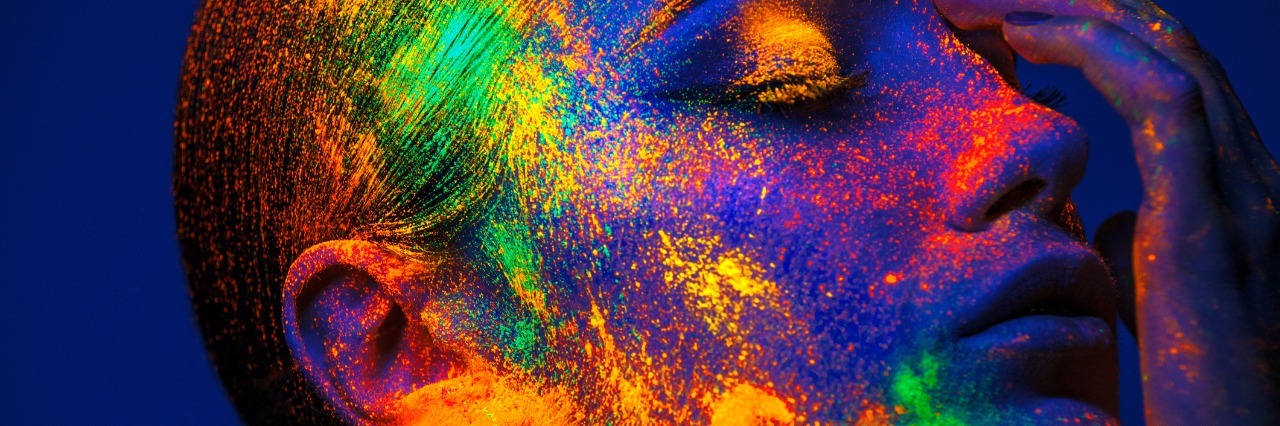 I'm Autistic. I'm Not 'Normal.' And That's OK. Woman with Neon Makeup powder
