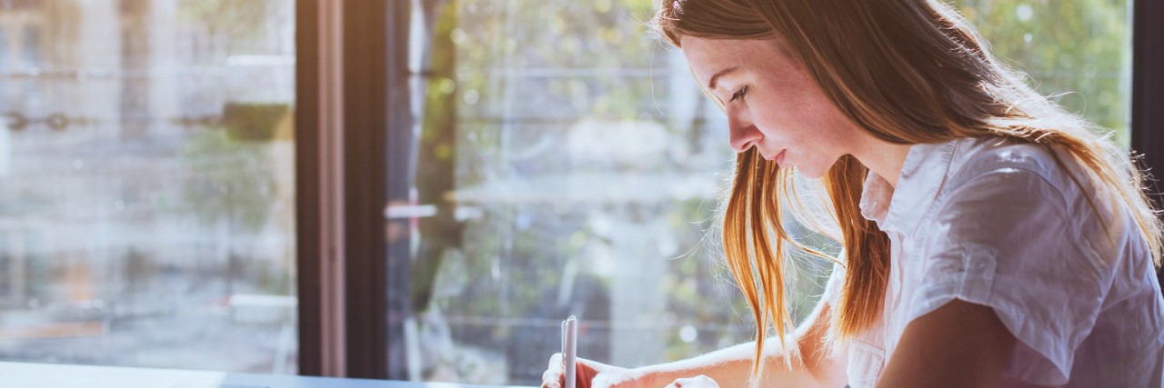 Dealing With a Chronic Mental Illness in College student in classroom during exam
