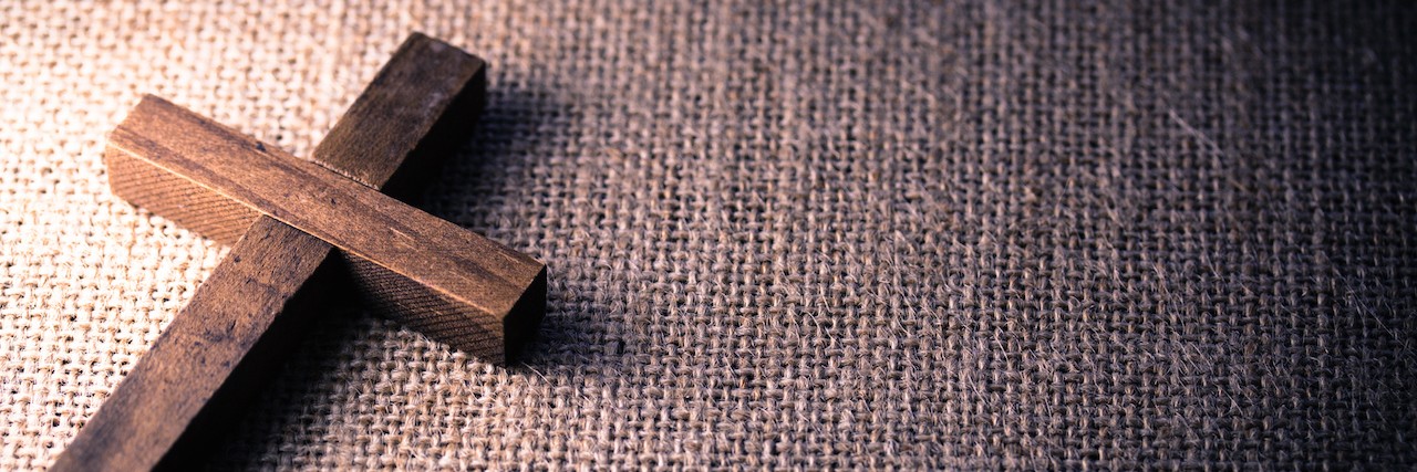 Trusting in God During Mental Health Treatment A wooden cross