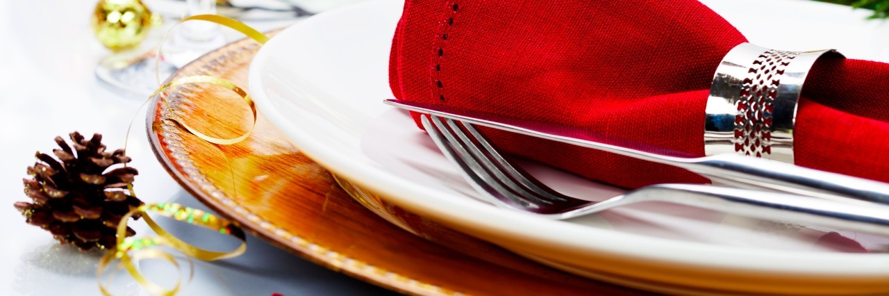 How To Have Fun at Holiday Dinner Events With Gastroparesis Christmas table place setting with christmas decorations