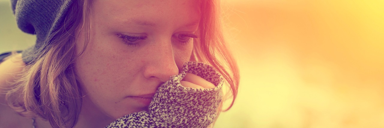 woman looking sad