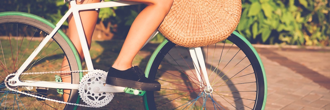 Living With Both an Addiction and Depression woman riding her bike