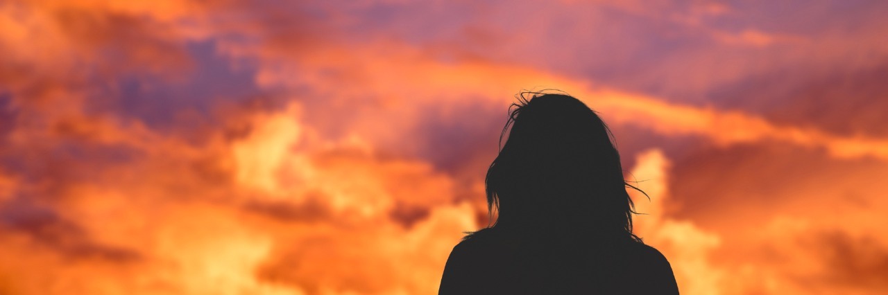 Things I Wish I Knew Before I Was Diagnosed With Depression silhouette of a girl watching the sunset