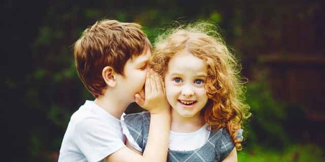 How to Help Your Child Navigate an Invisible Condition Little boy and girl whispers.