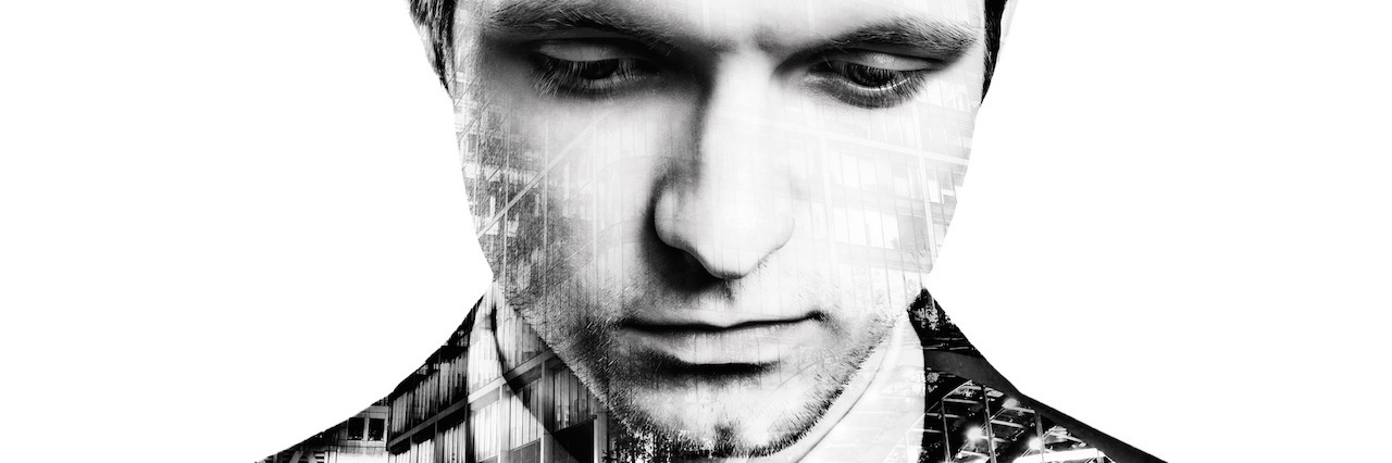 Man With Depression Shares Lessons After Suicide Attempt business man looking down