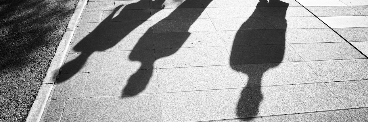 What 'Kind' of People Attempt Suicide? shadows of people on the street